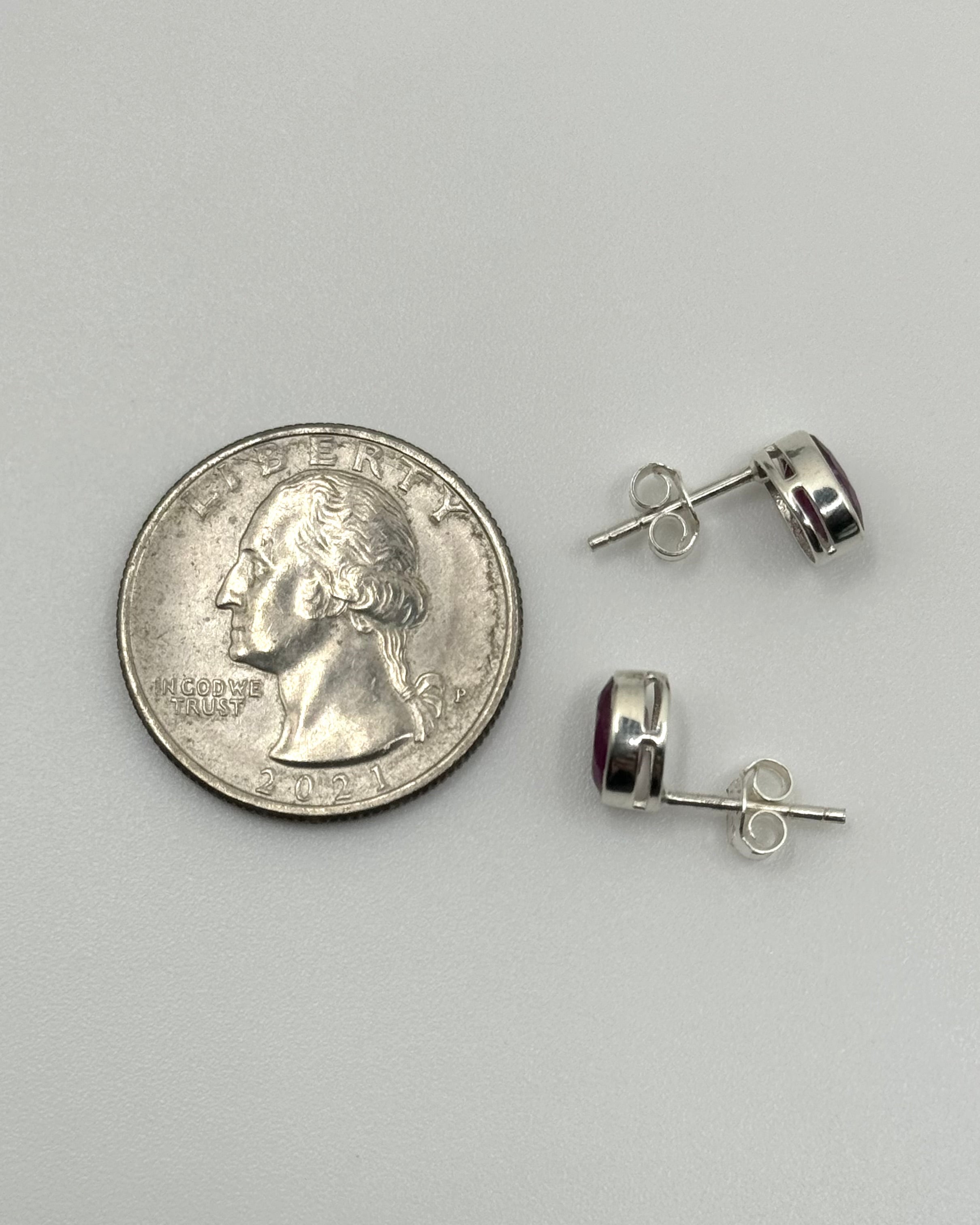 •FACETED RUBY - LIL' OVAL• silver bezel set stud earrings