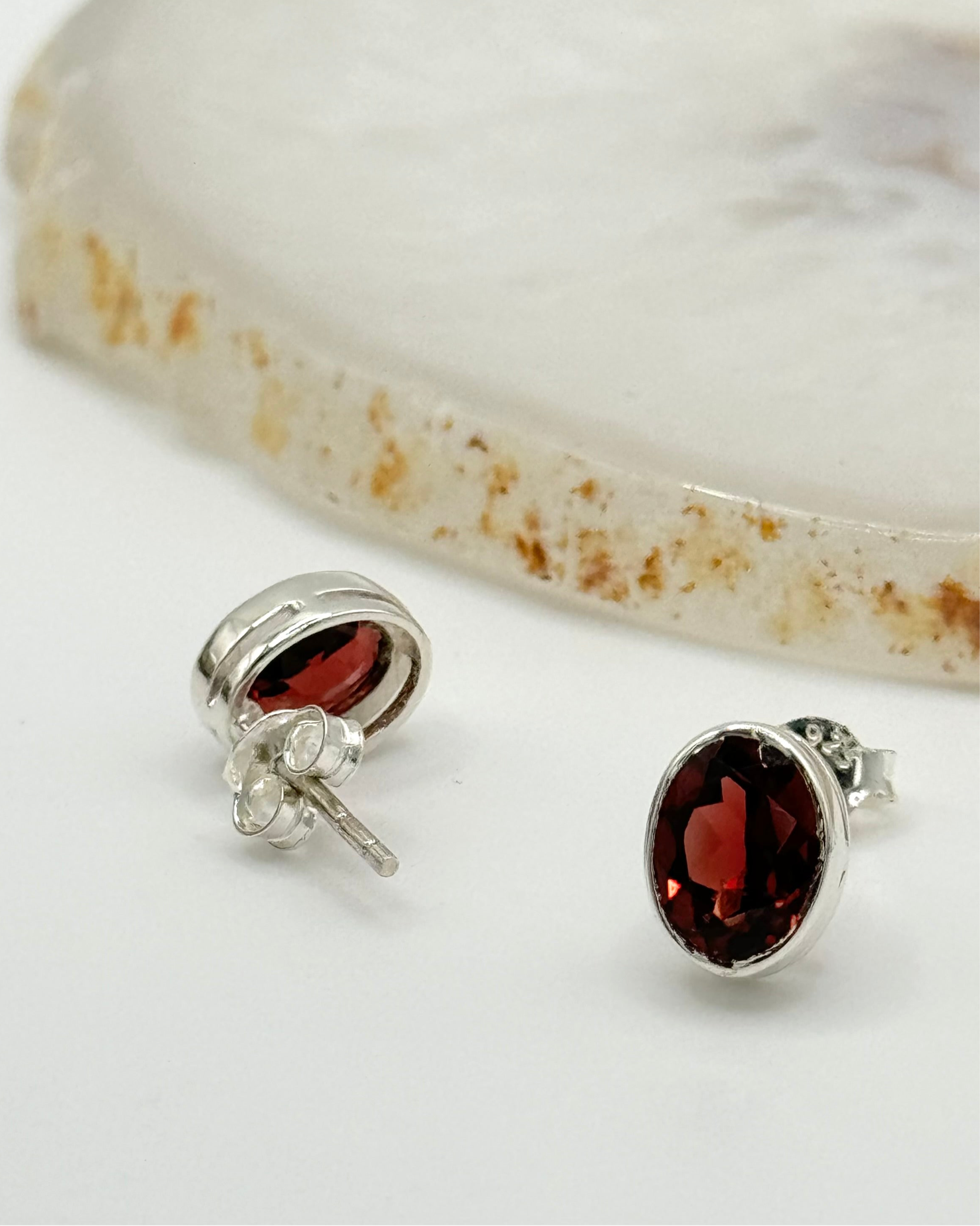 •FACETED GARNET - LIL' OVAL• silver bezel set stud earrings