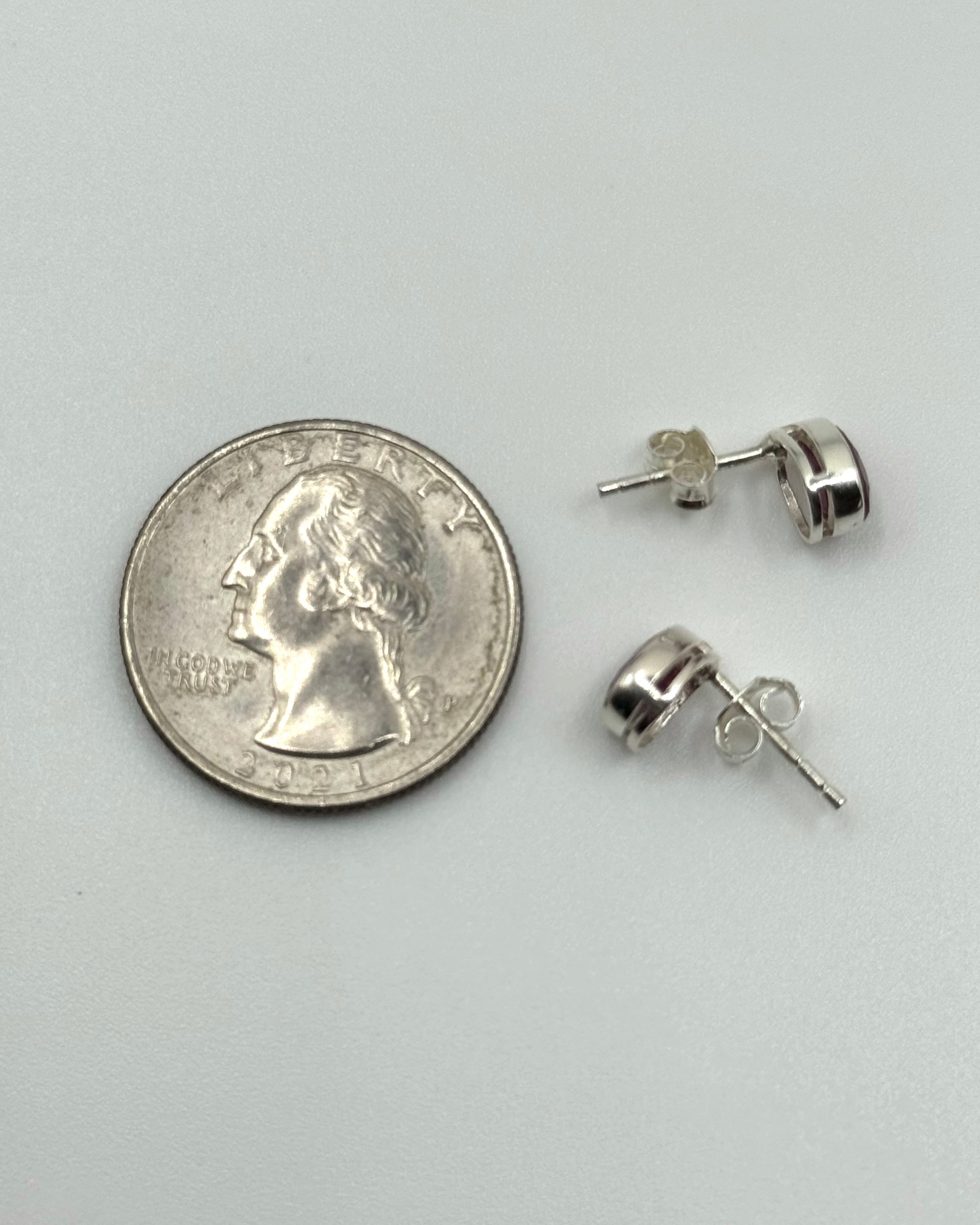 •FACETED RUBY - LIL' TEARDROP• silver bezel set stud earrings