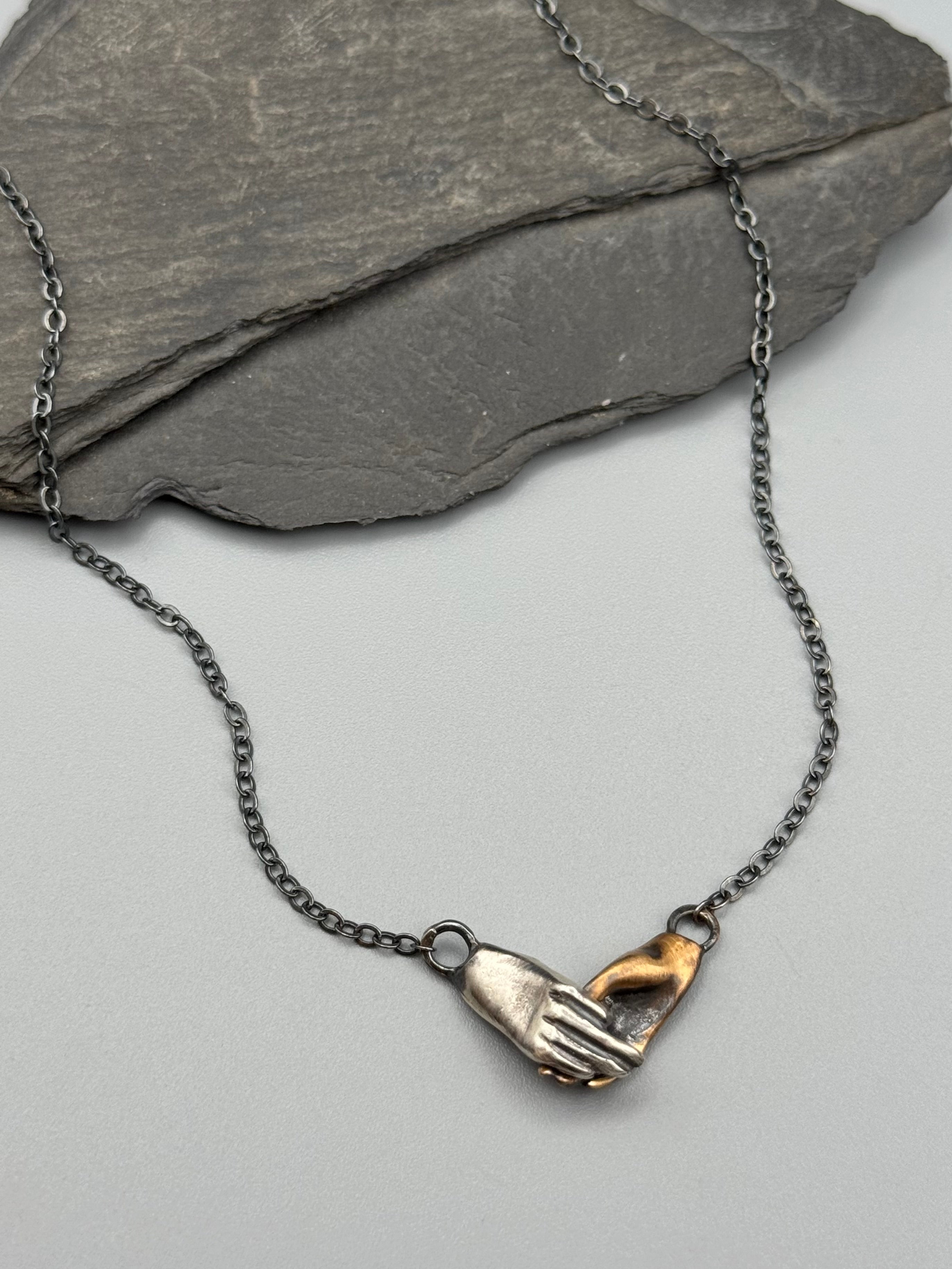 •HOLDING HANDS• mixed metal necklace (19.5" long)