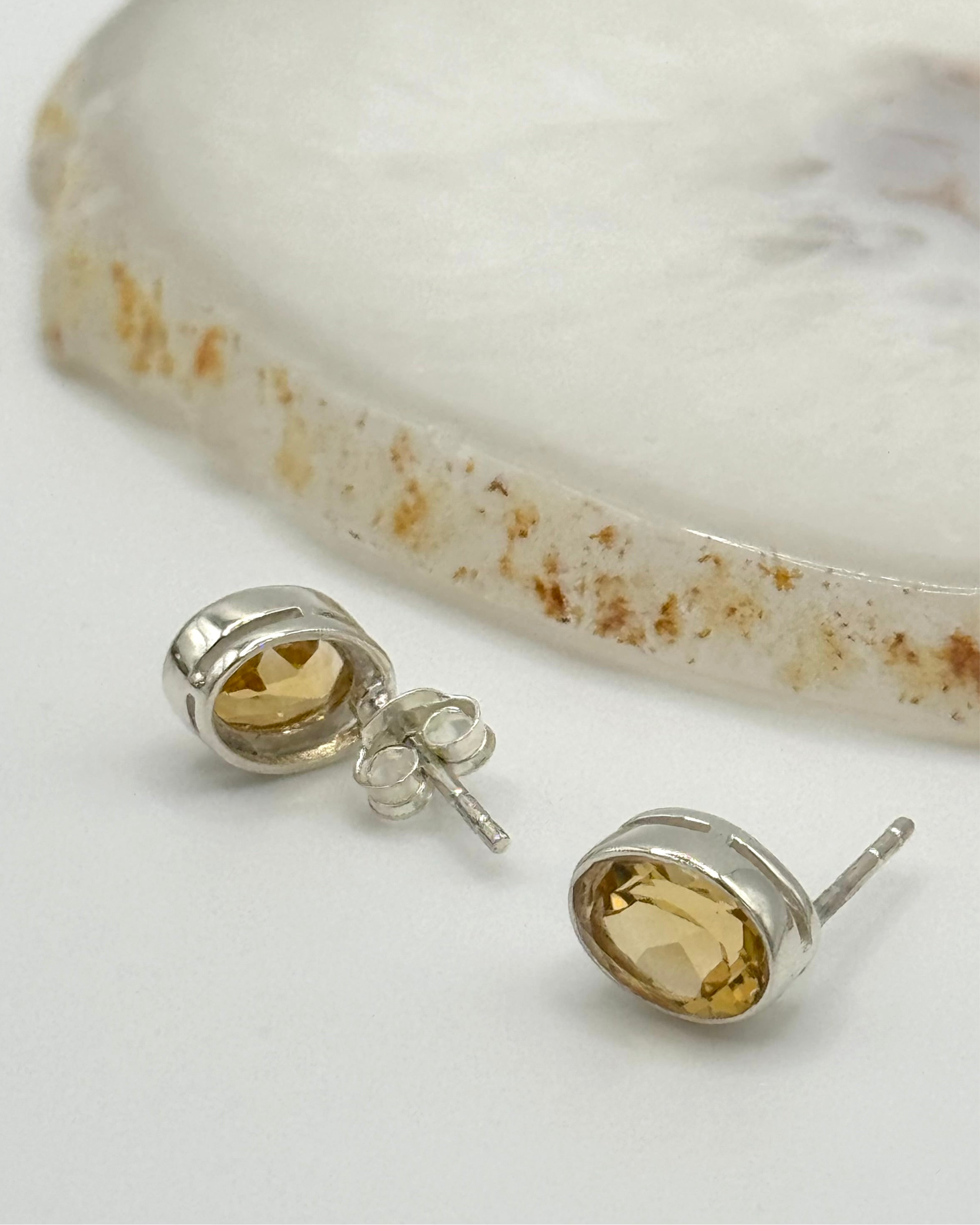 •FACETED CITRINE - LIL' OVAL• silver bezel set stud earrings