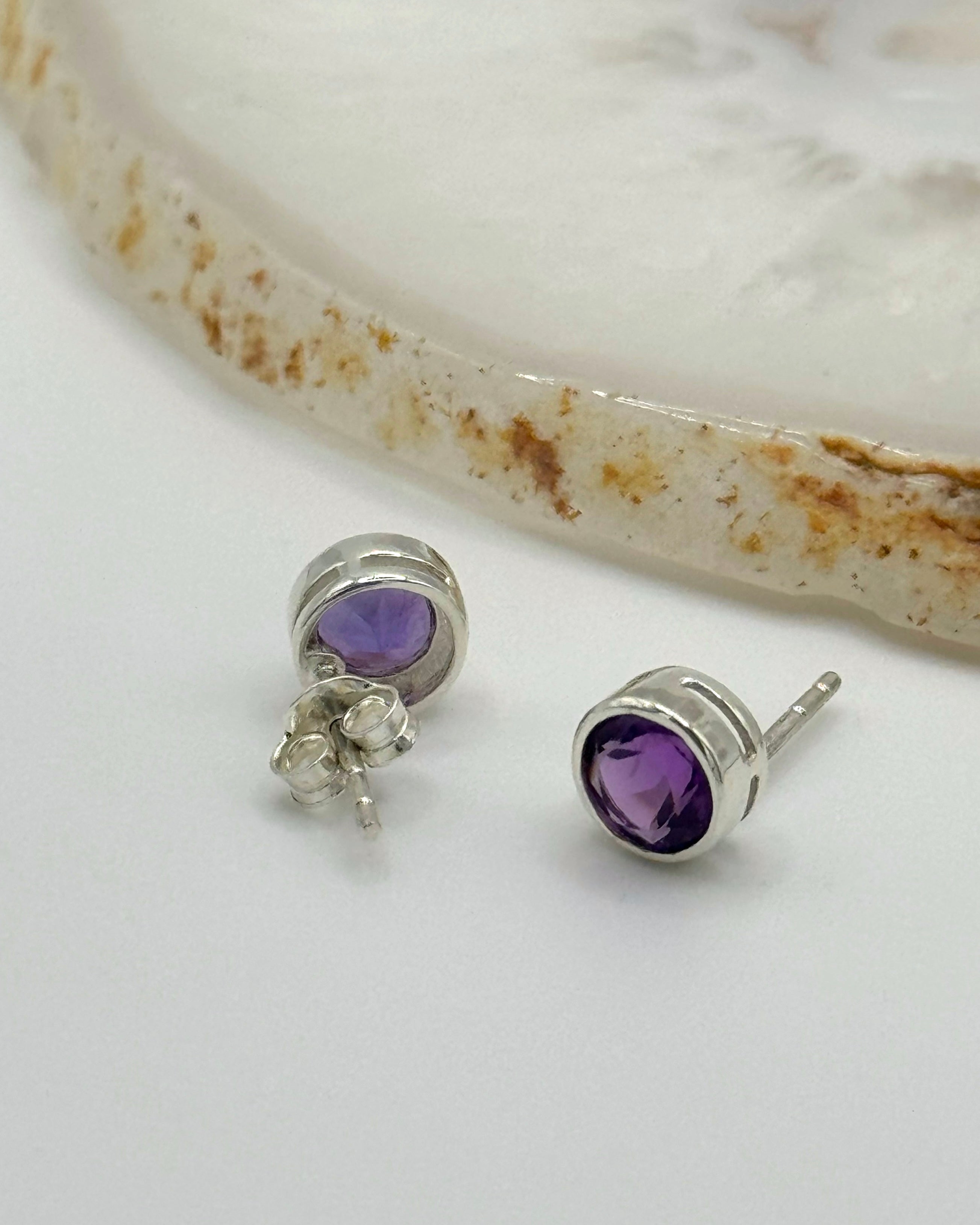 •FACETED AMETHYST - LIL' CIRCLE• silver bezel set stud earrings