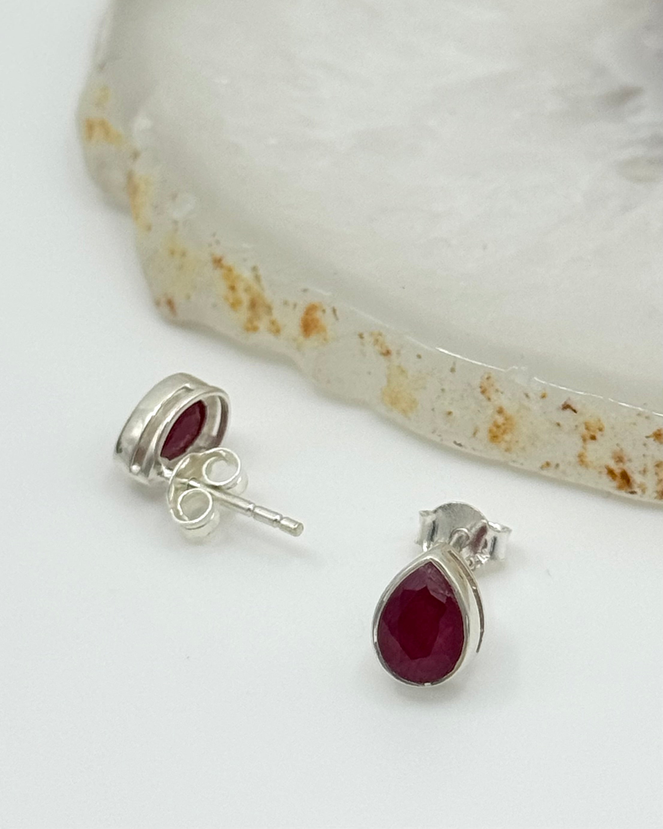 •FACETED RUBY - LIL' TEARDROP• silver bezel set stud earrings