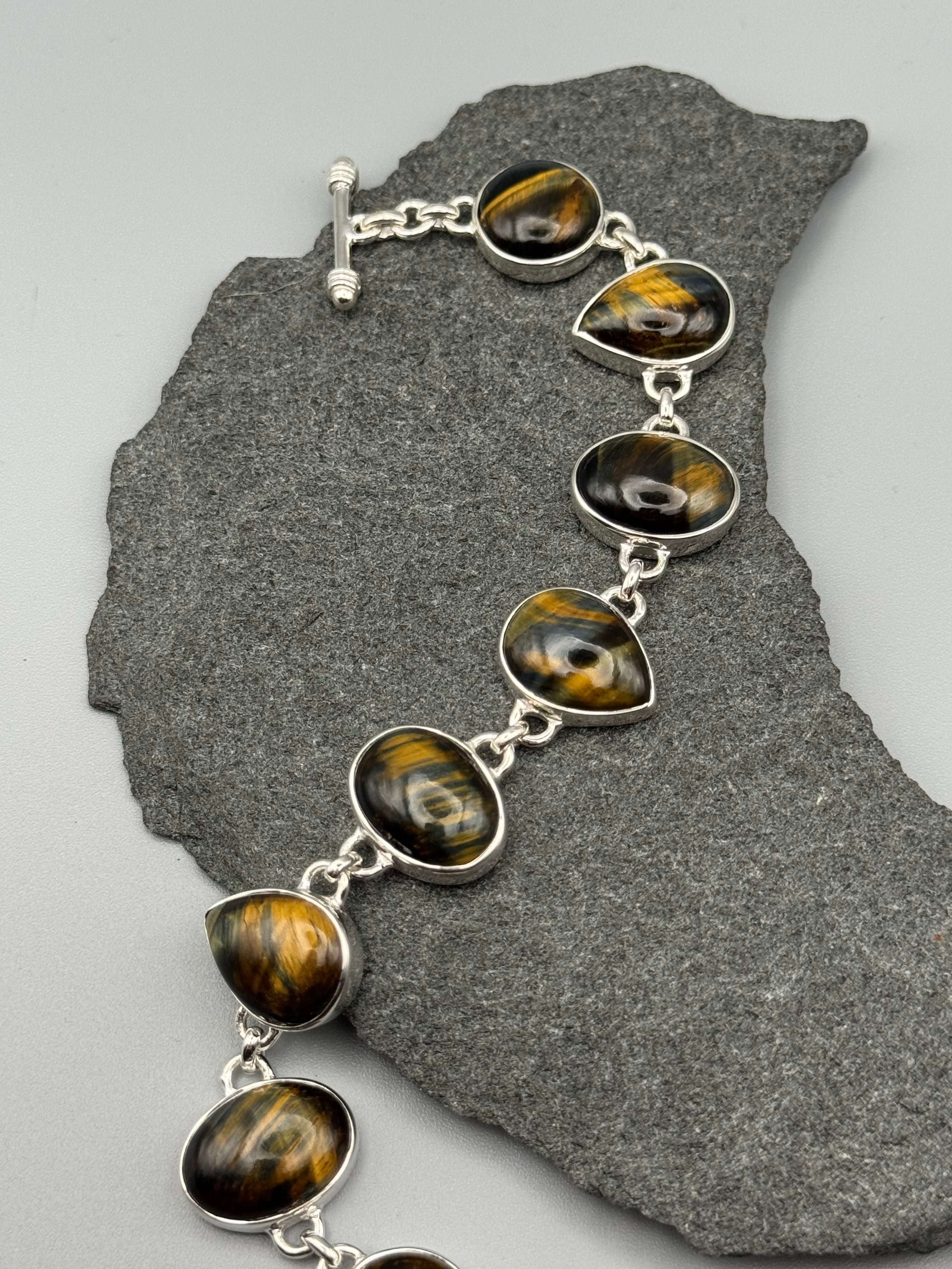 •HAWK EYE - GEO MIX• linked silver bracelet (7.25" - 8.5")