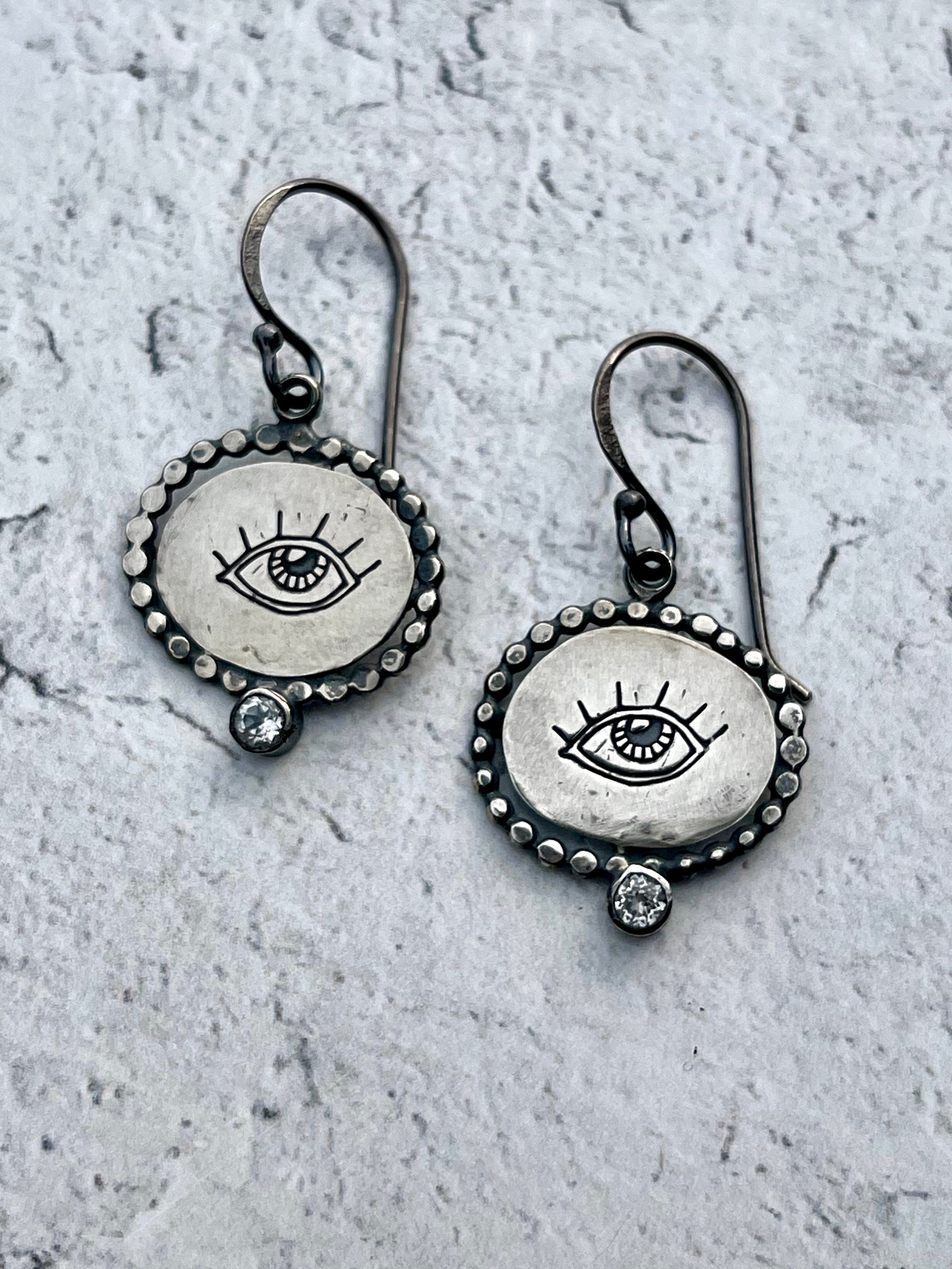 •PROTECTIVE EYE CAMEO• embedded topaz + silver dangle earrings