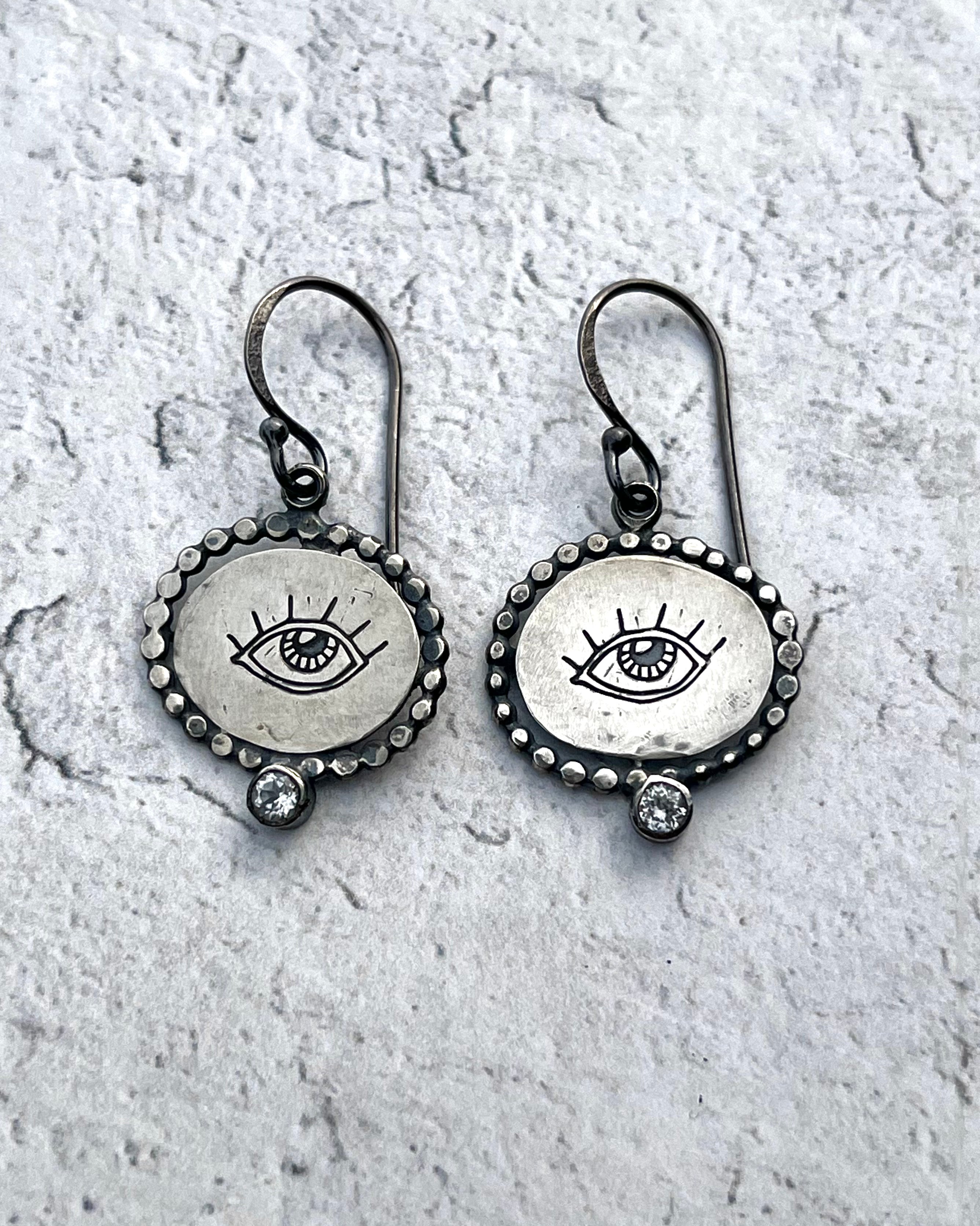 •PROTECTIVE EYE CAMEO• embedded topaz + silver dangle earrings