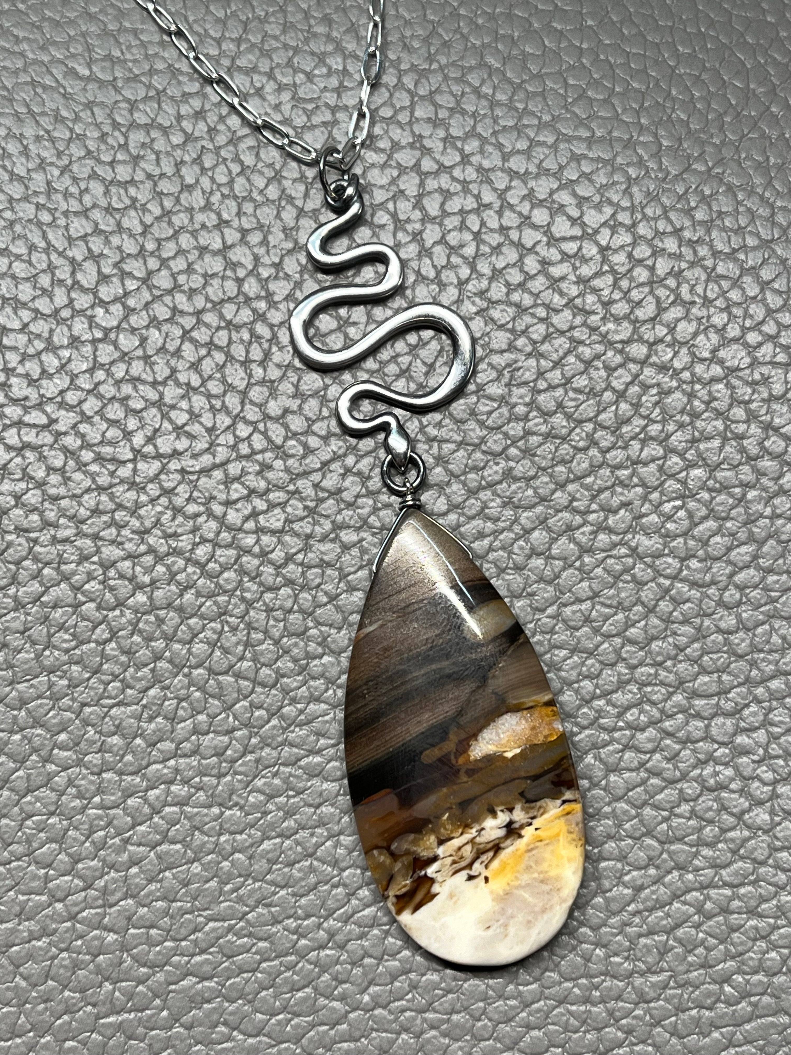 •SUEÑO• fossilized peanut wood + snake + silver necklace (26"-28")