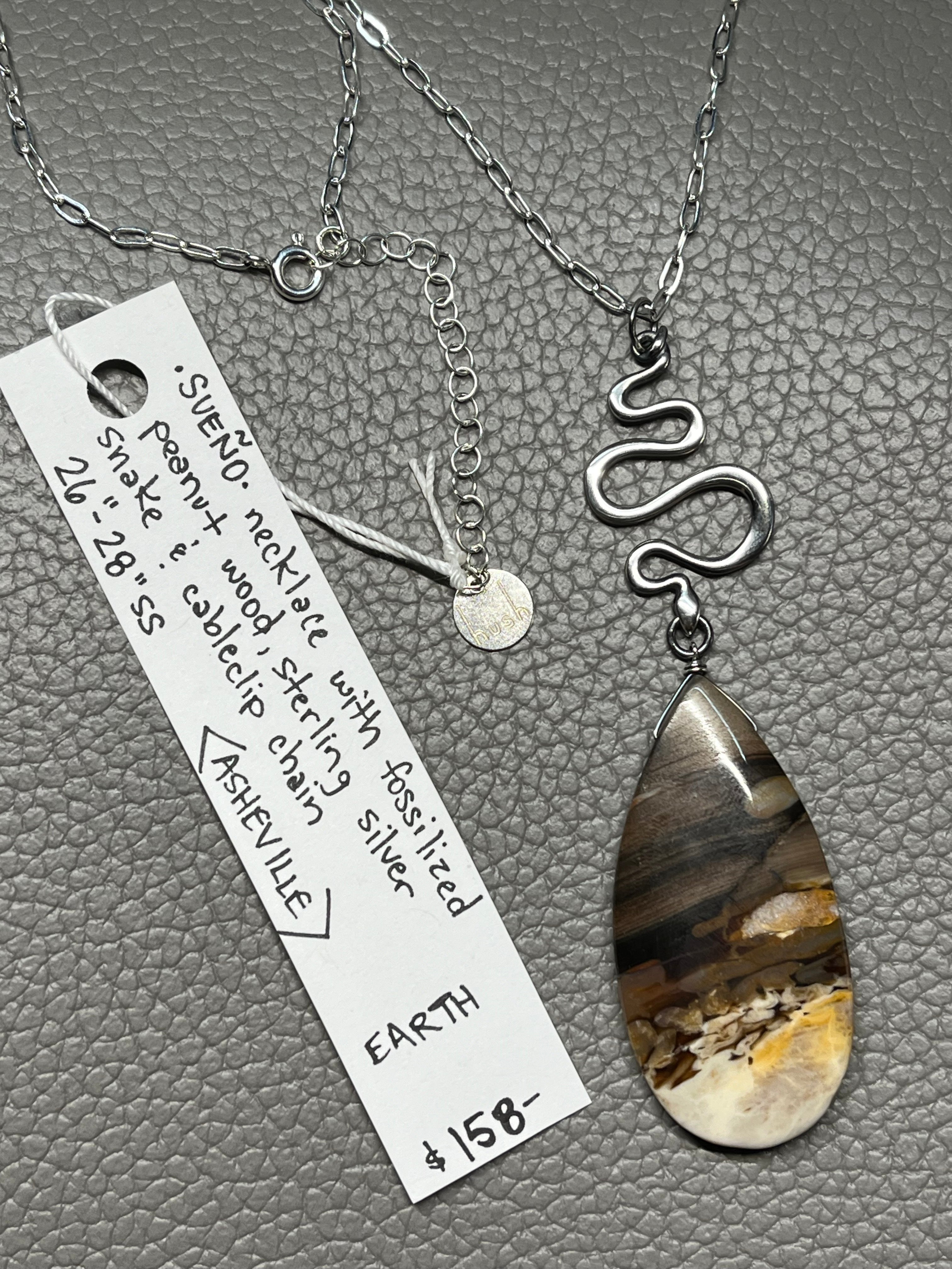 •SUEÑO• fossilized peanut wood + snake + silver necklace (26"-28")