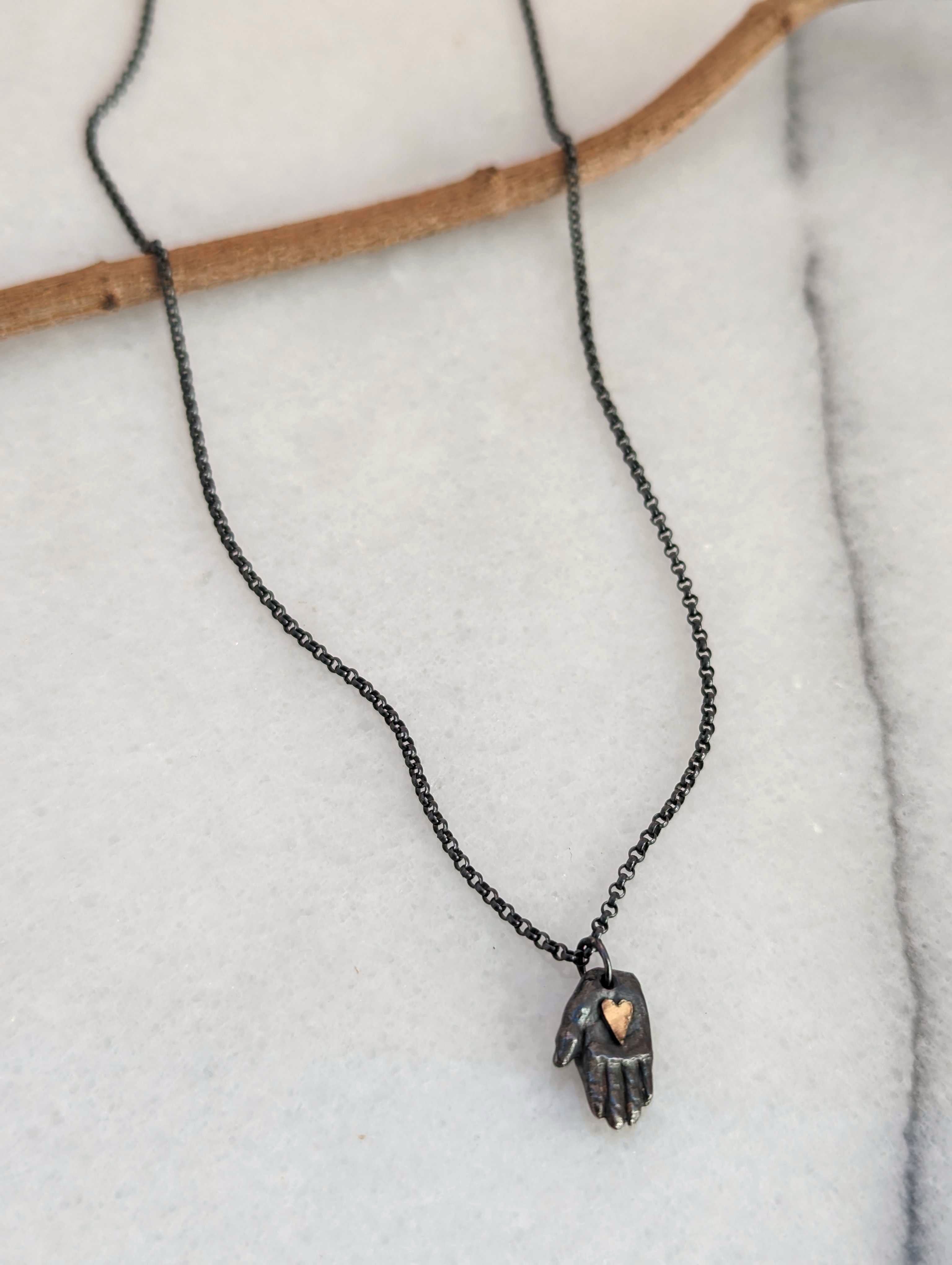 •TINY GIVING HAND• mixed metal necklace