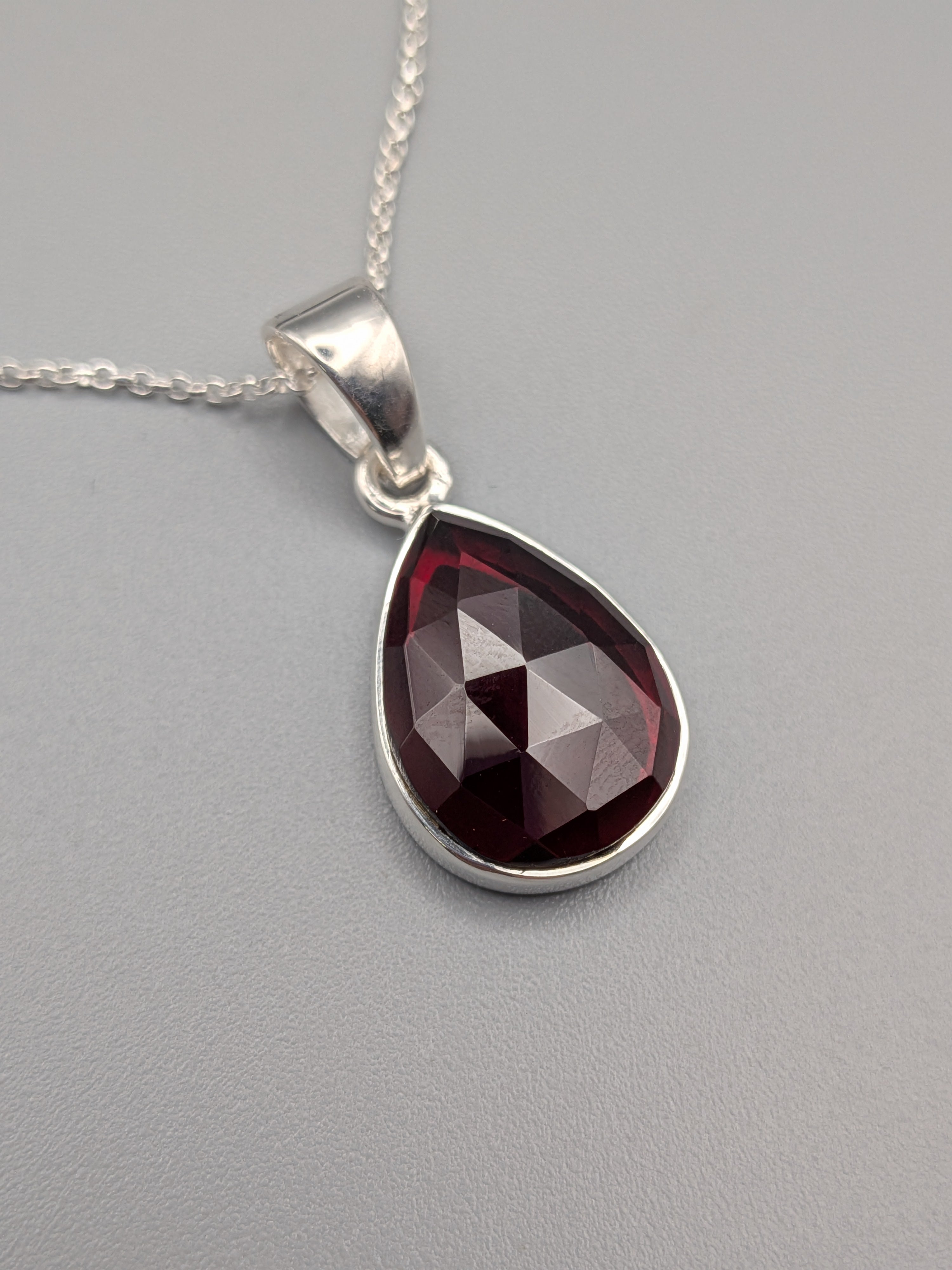 •GARNET - FACETED TEAR - 1• silver necklace (18" long)