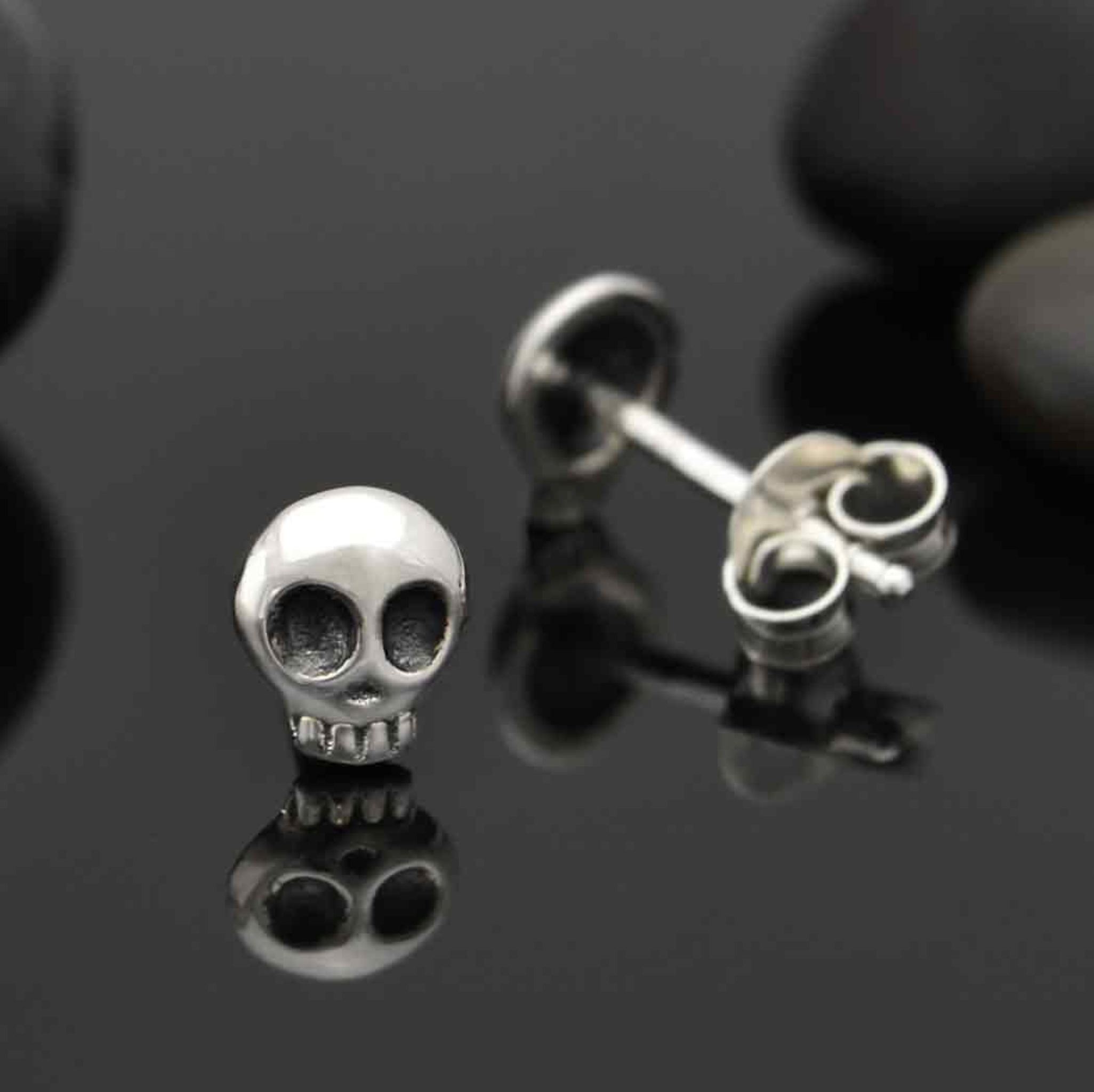 •TINY SKULL• recycled silver stud earrings