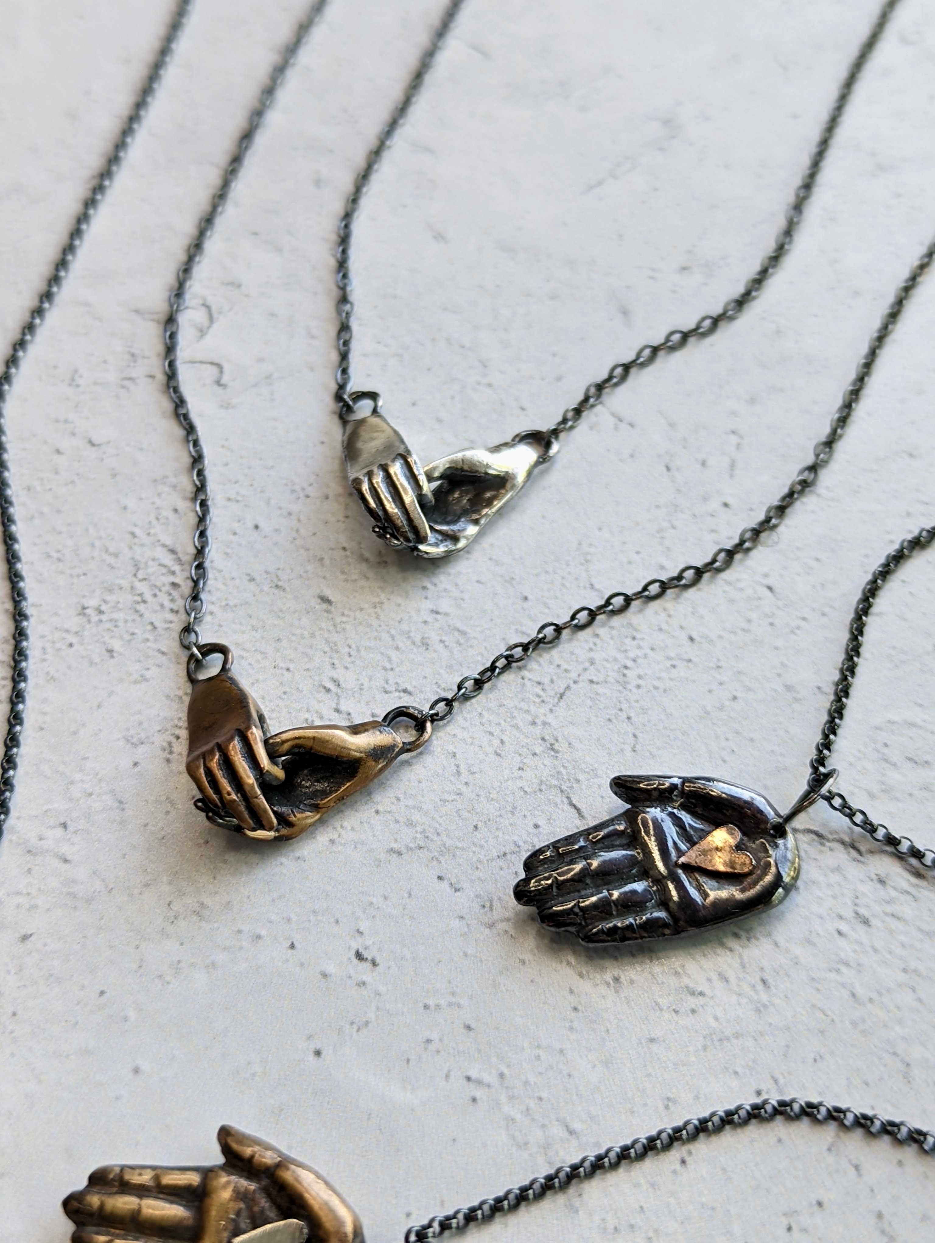 •HOLDING HANDS• oxidized silver necklace (18" long)