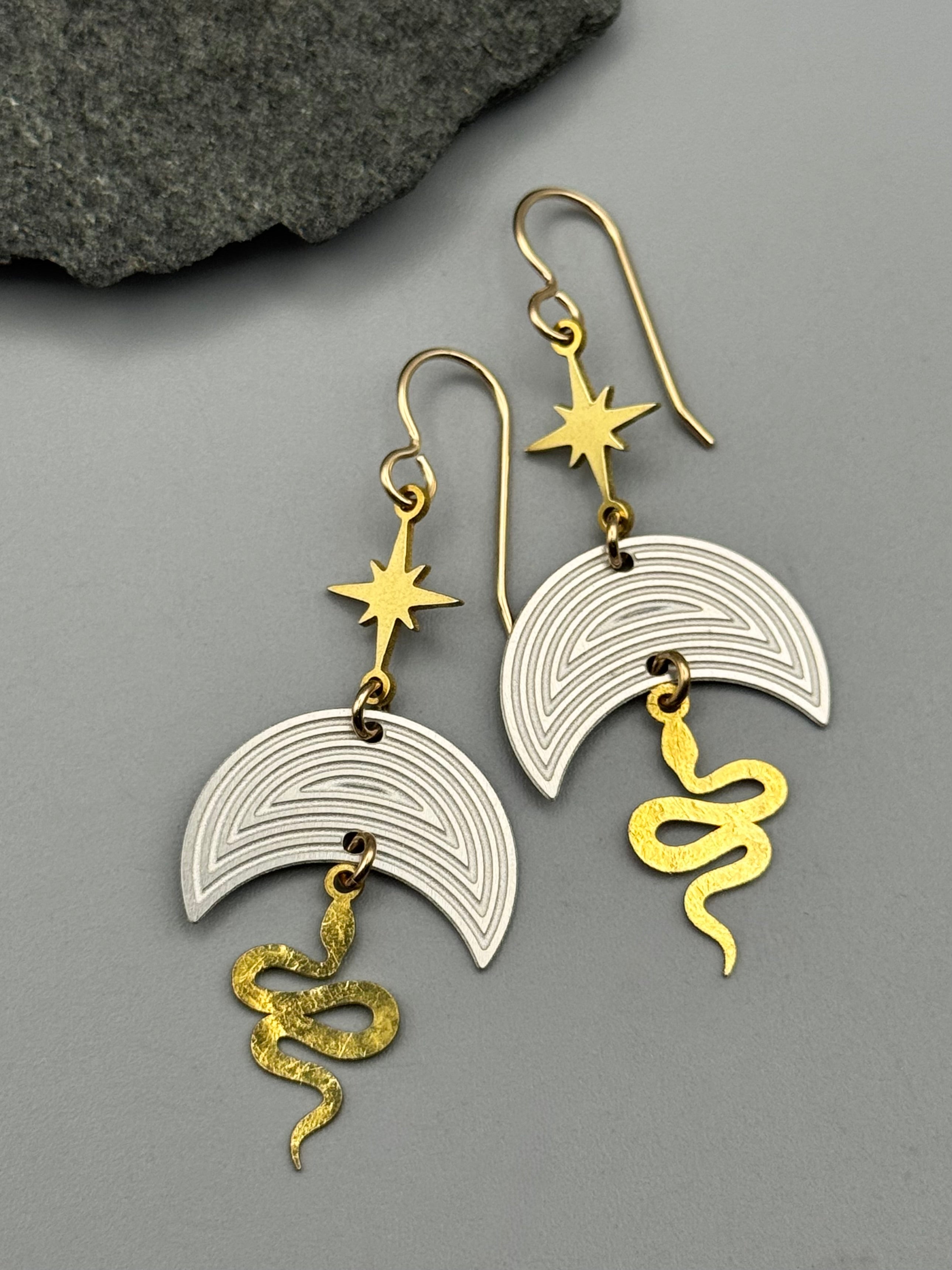 •NĀGA NYX• mixed metal dangle earrings