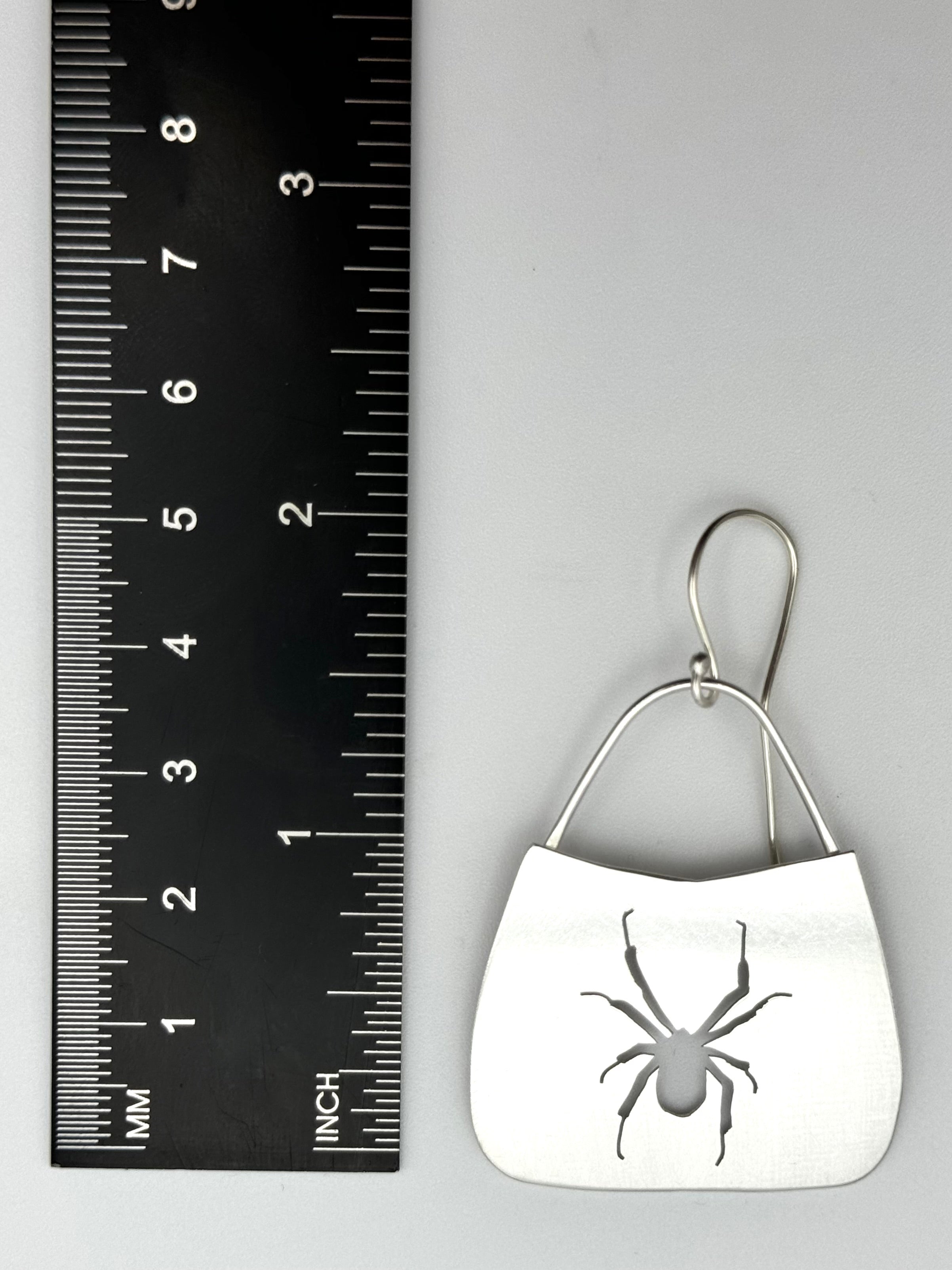 •ARAÑA• spider silhouette + silver dangle earrings