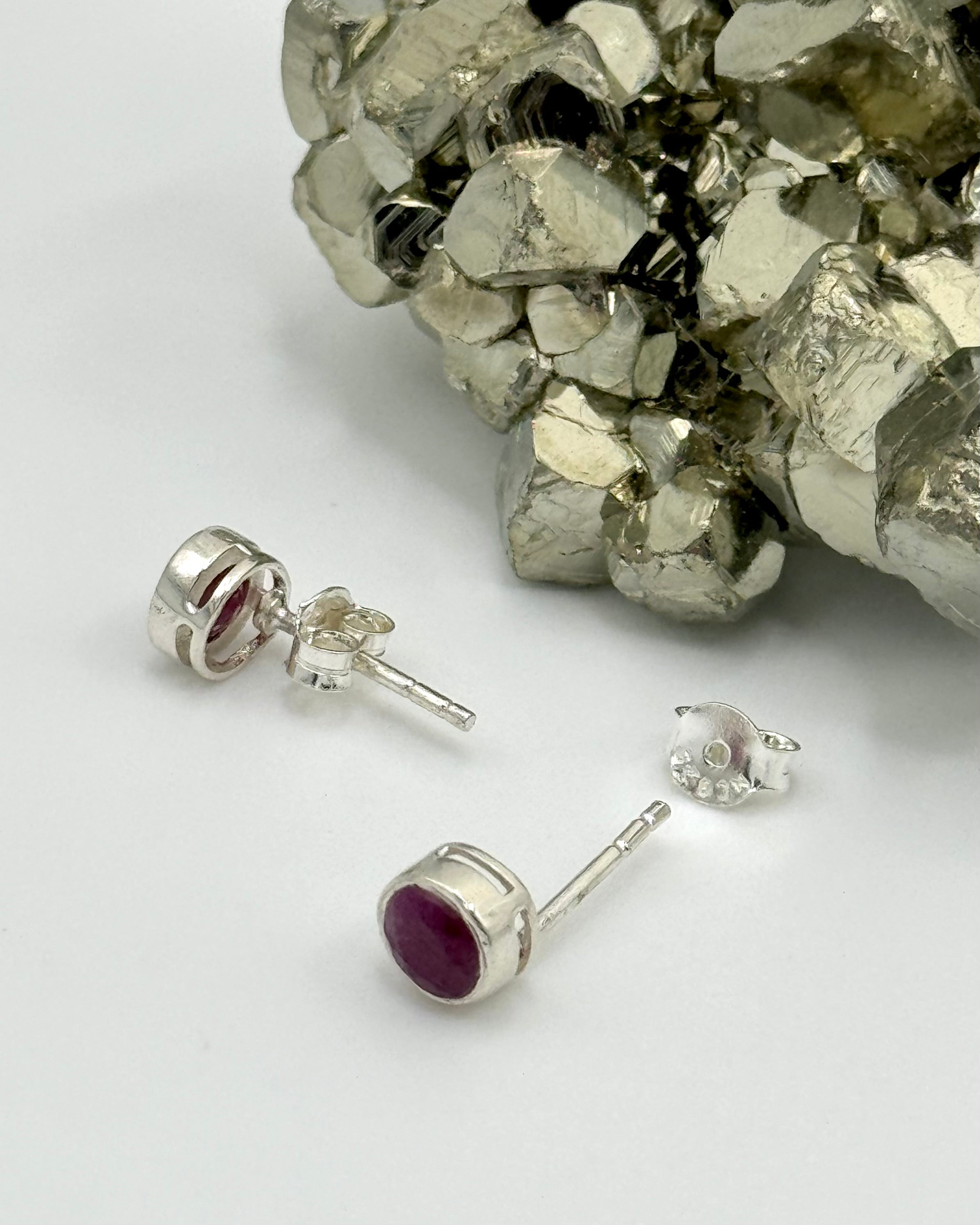 •FACETED RUBY - LIL' CIRCLE• silver bezel set stud earrings