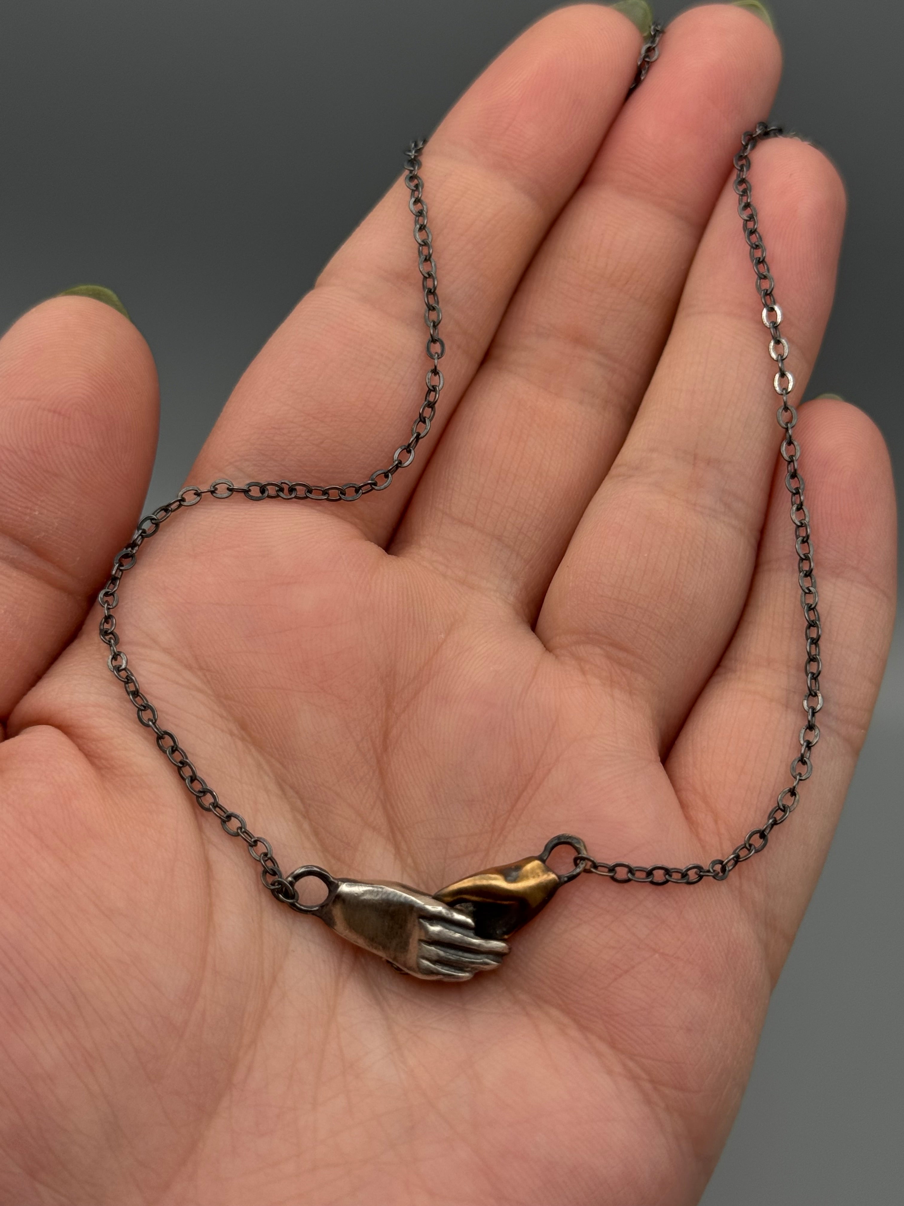 •HOLDING HANDS• mixed metal necklace (19.5" long)