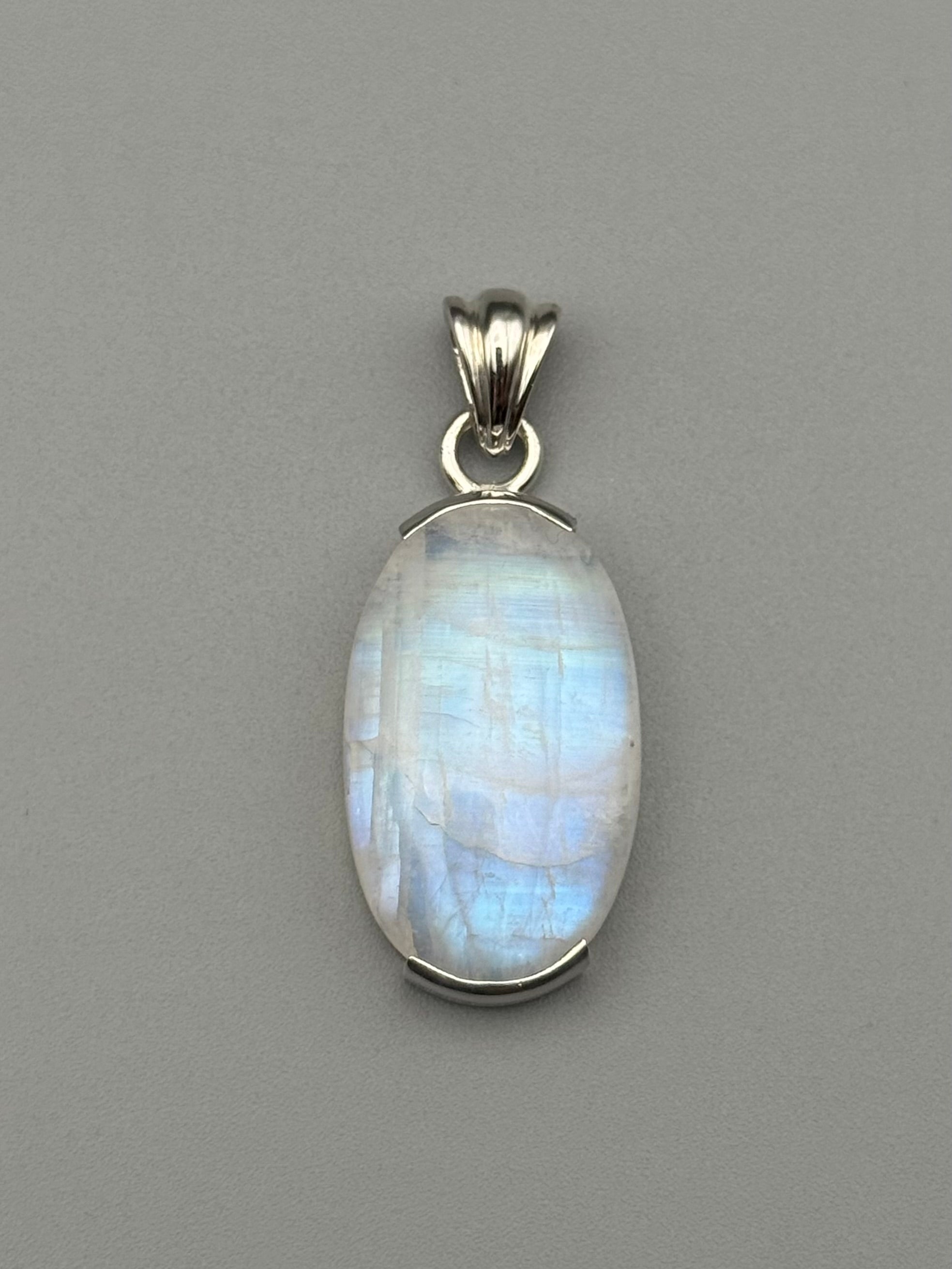 •RAINBOW MOONSTONE - OVAL• bezel capped silver pendant