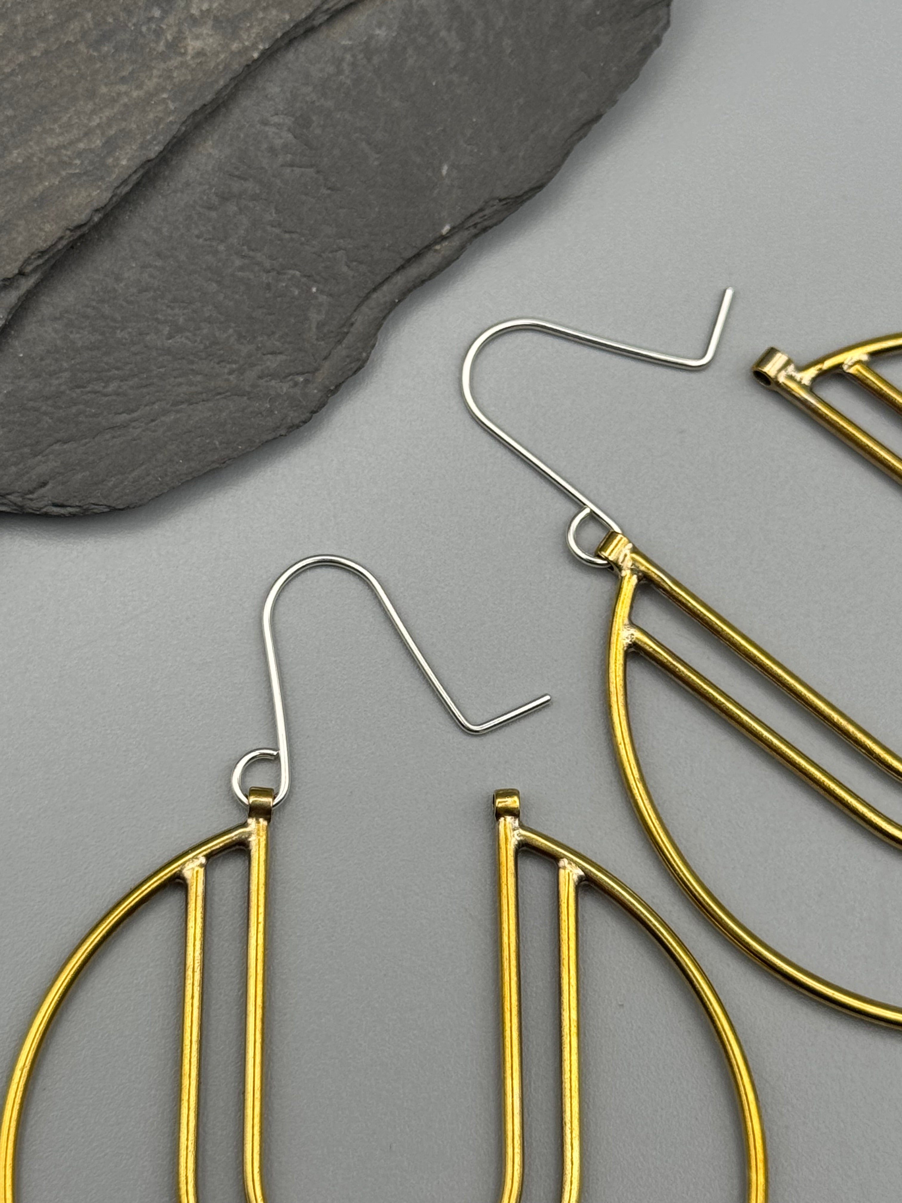 •CRESCENT YOU• brass hoop earrings