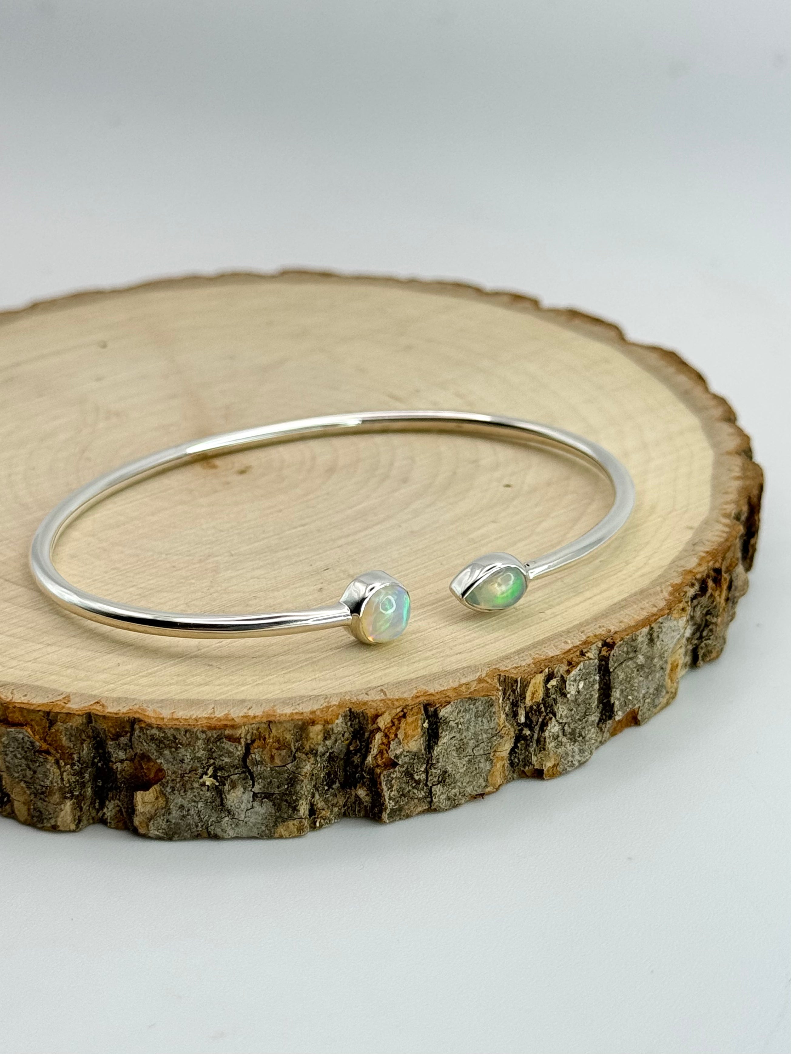 •CIRCLE + TEARDROP• ethiopian opal + silver twist-on cuff bracelet