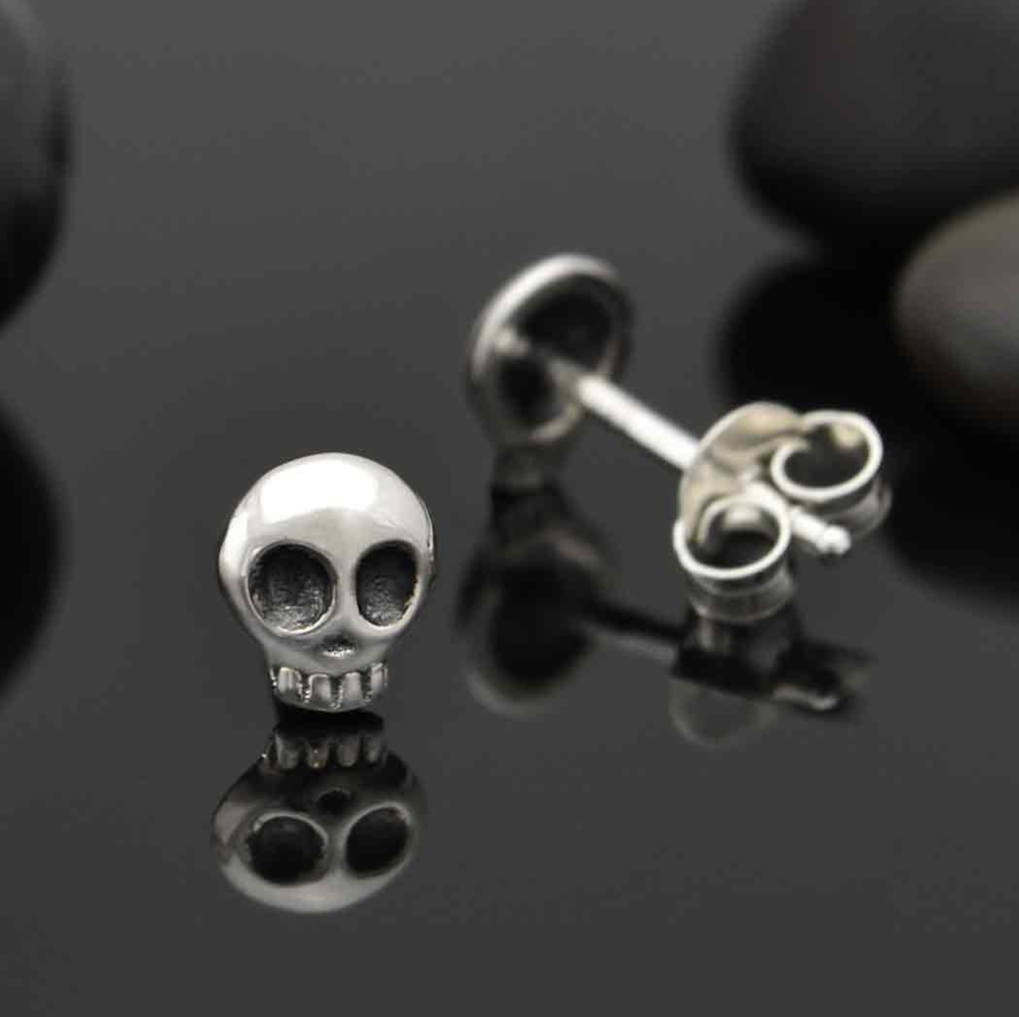 •TINY SKULL• recycled silver stud earrings